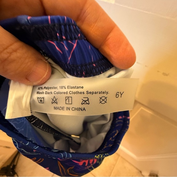 SHEIN Kids Swim Trunks - Blue with Neon Dinosaur Print - Picture 4 of 5